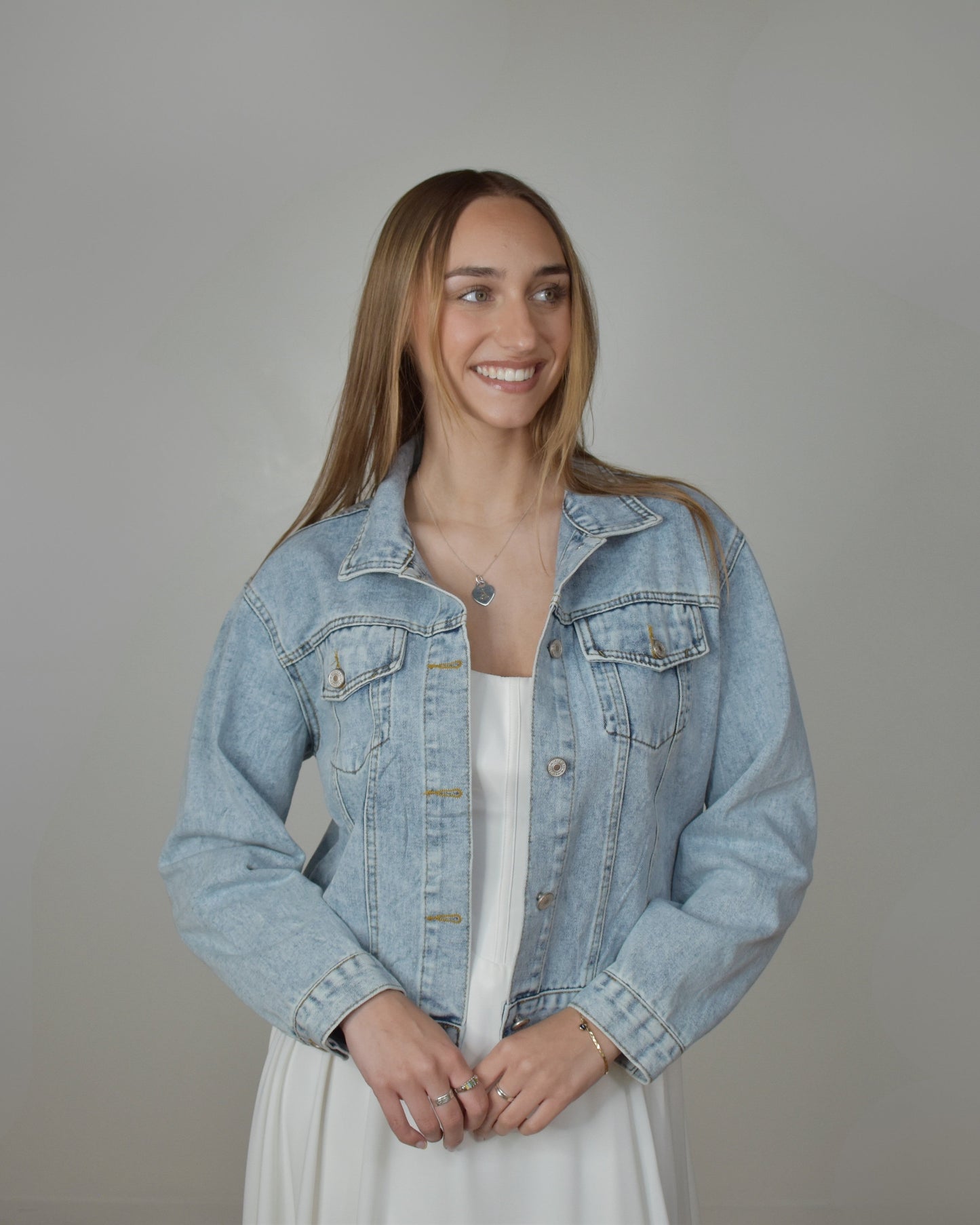 bride in denim jacket