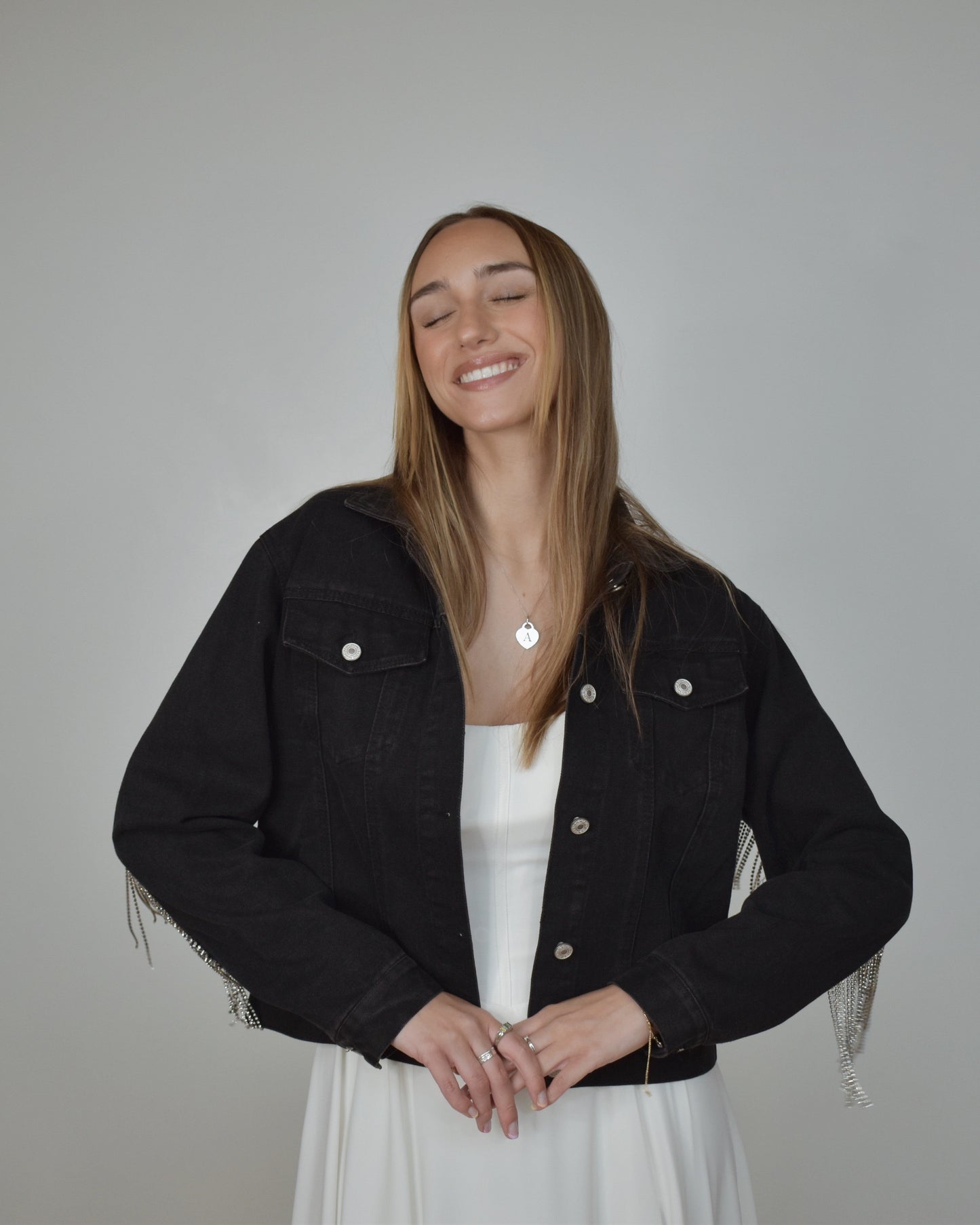 bride wearing black denim jacket