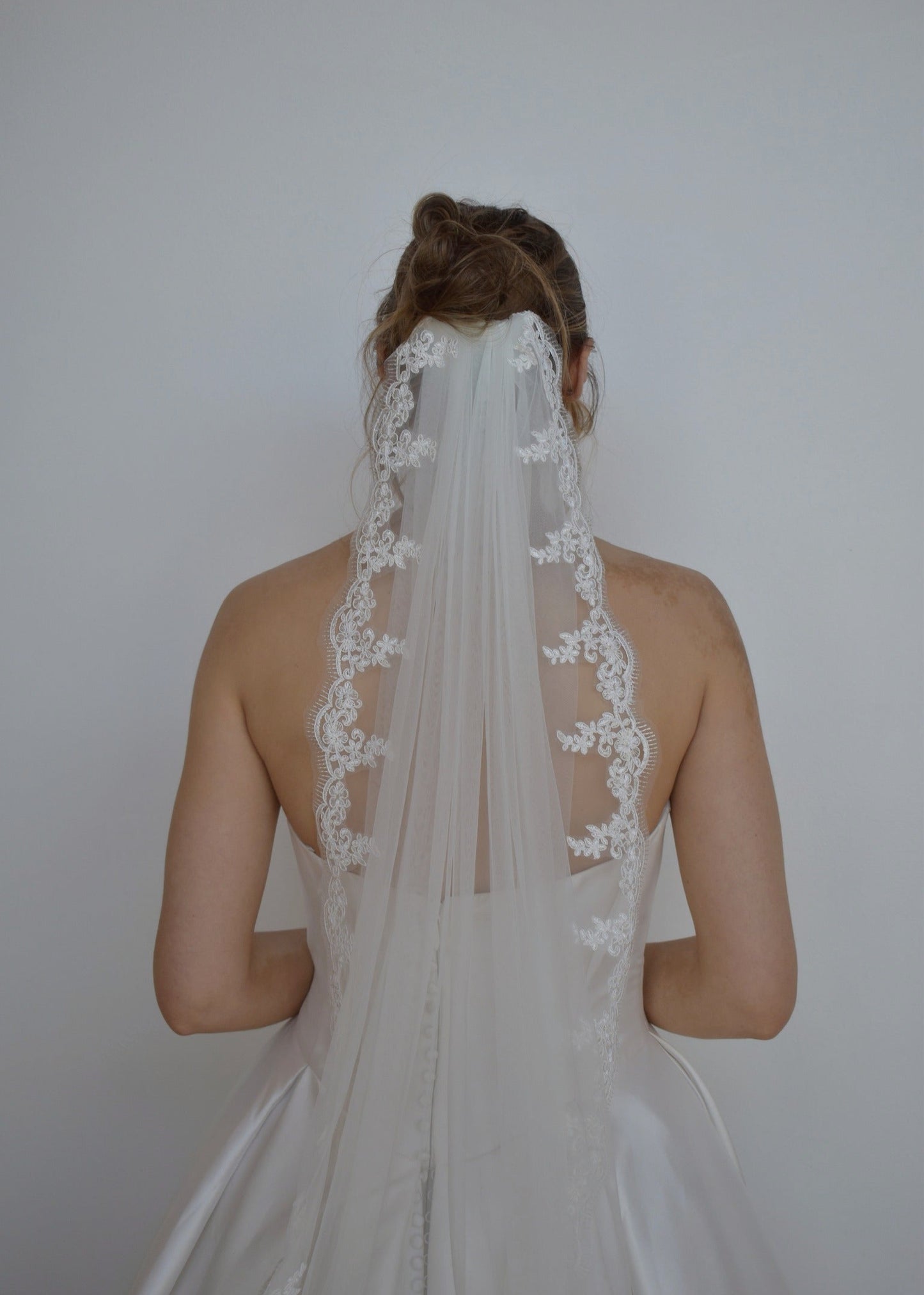 fingertip lace veil from the back