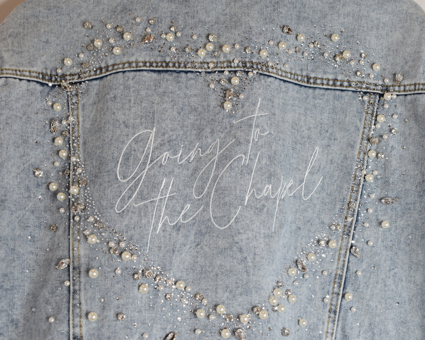 back of bridal jacket with rhinestone heart