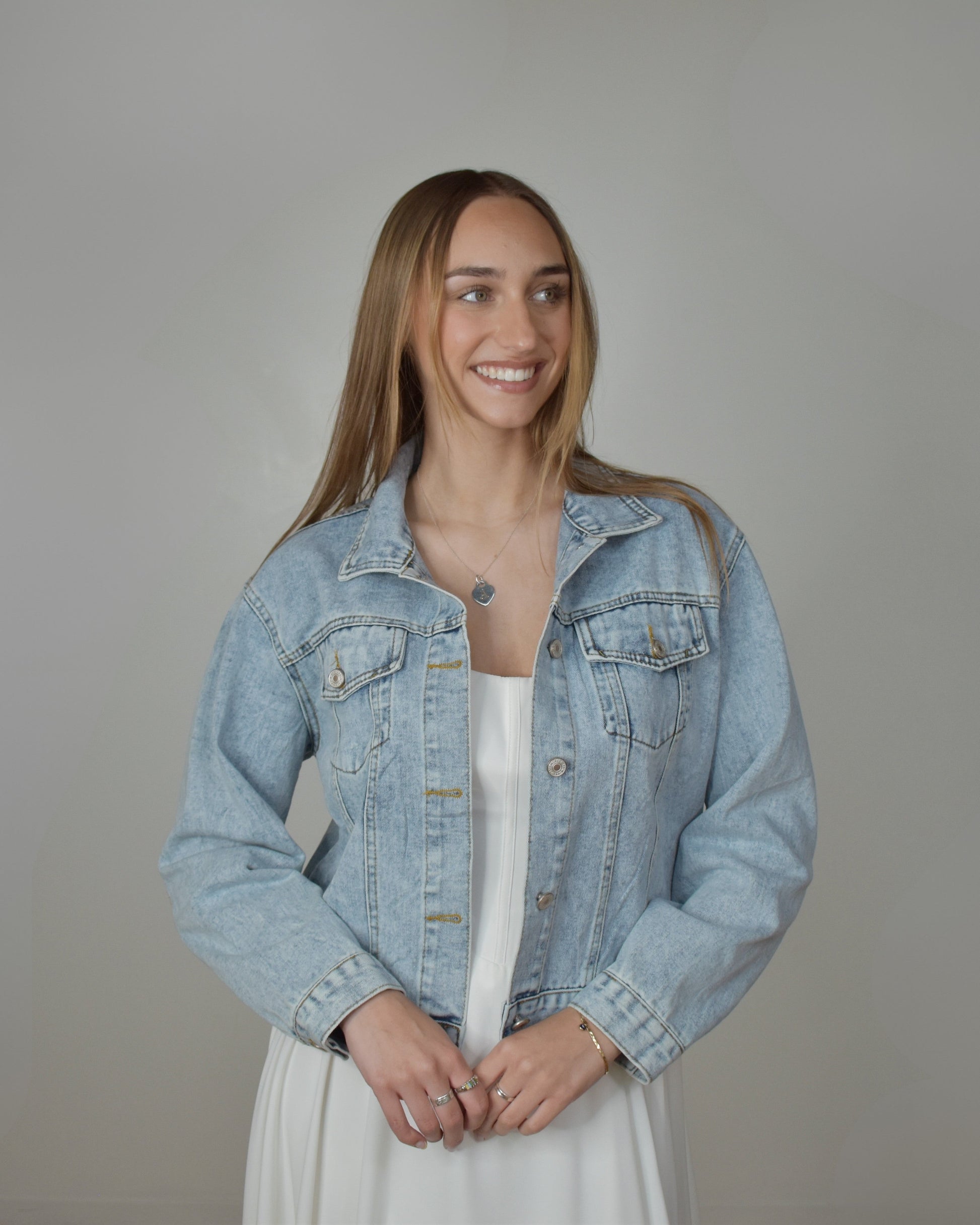 bride in denim jacket