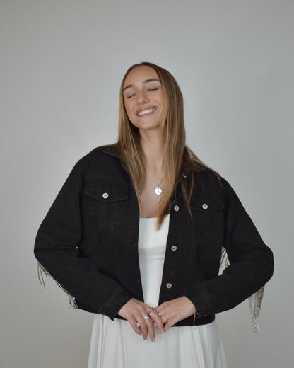 bride wearing black denim jacket