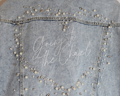 back of bridal jacket with rhinestone heart